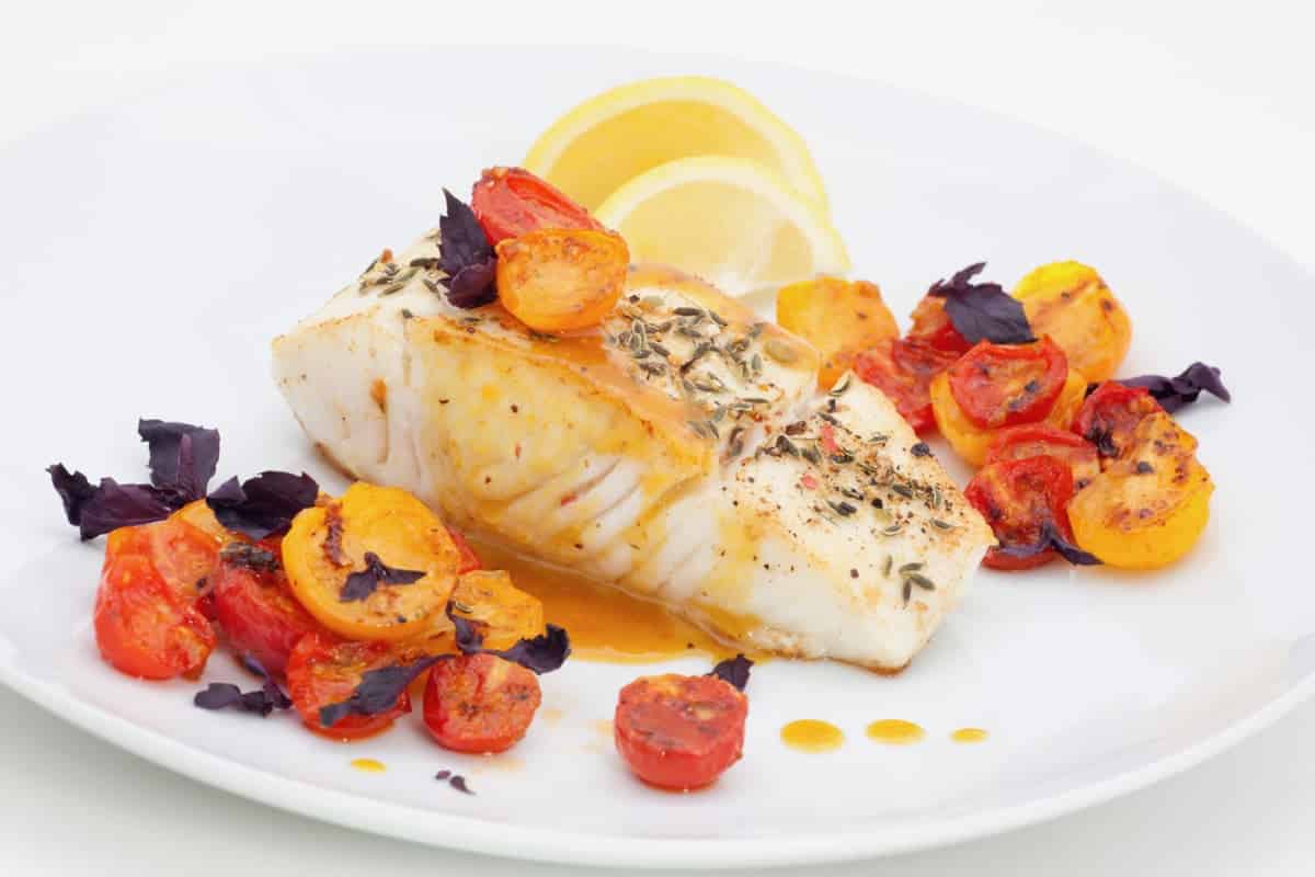 plate of baked halibut