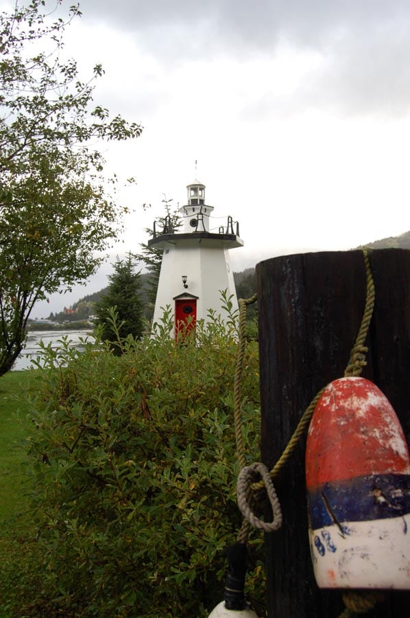 lighthouse with inlet in background